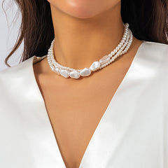 Loookus - Ladies with vintage pearls stacked with woven Baroque ornaments