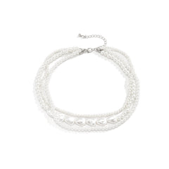 Loookus - Ladies with vintage pearls stacked with woven Baroque ornaments