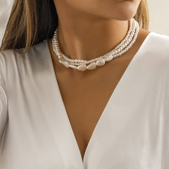 Loookus - Ladies with vintage pearls stacked with woven Baroque ornaments