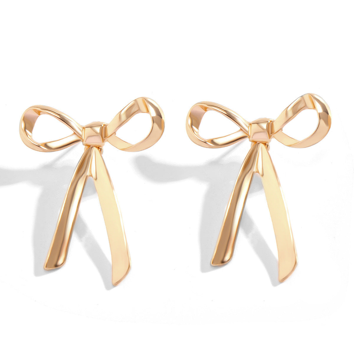 Loookus - Bow-knotted Metal Earrings