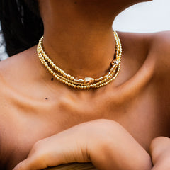 Loookus - Ladies with vintage pearls stacked with woven Baroque ornaments